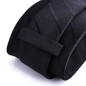 Black woven necktie detail shot for men business formal wear wedding suit neck tie accessory