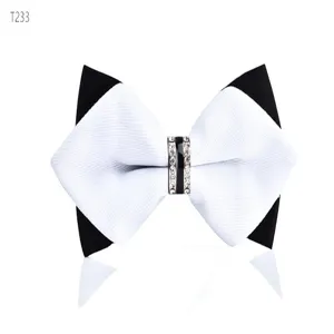 Elegant black and white pointed bow tie with sparkling crystal ring for men wedding suit.