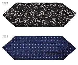 Detailed view of classic men ascot neckties featuring elegant floral and polka dot patterns.