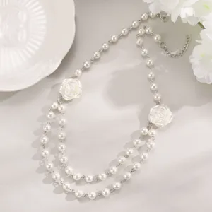 Elegant multi-layer pearl choker necklace with white flower charms for women vintage style