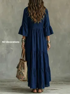 Retro langes blaues Damen Maxikleid mit langen Ärmeln und V-Ausschnitt im eleganten Vintage Stil.