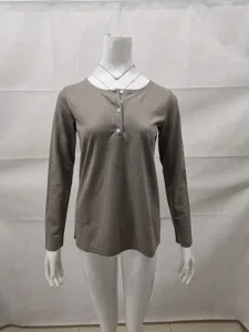 Ribbed long sleeve Henley shirt detail, button-up collar, casual slim fit top close-up view.