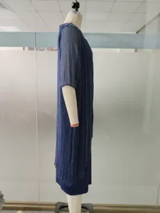 Detailed view of the elegant navy blue sheer mesh long cardigan dress with subtle shimmer.