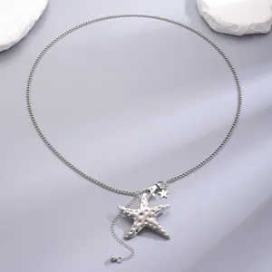 Silver metal waist chain with starfish pendant, boho beach dress accessory for women and girls.