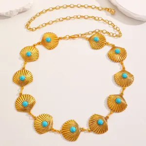 Boho gold metal waist chain with shell and turquoise stones for beach dresses and parties.