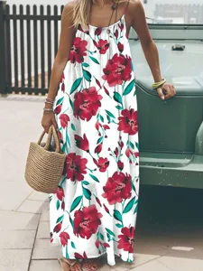 Bohemian floral print maxi dress featuring sleeveless design, delicate straps and relaxed fit.