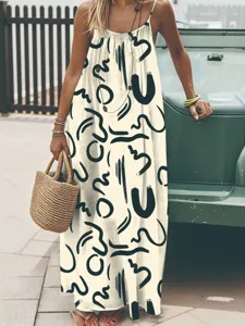Boho summer abstract print spaghetti strap maxi dress, loose sleeveless long dress detail view.