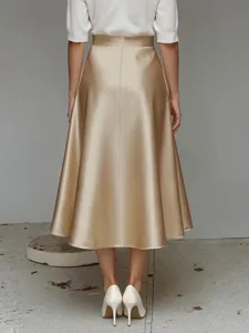 Back view detail of the elegant satin A-line midi skirt, featuring smooth glossy texture.