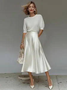 Elegant satin A-line midi skirt for women, perfect for elegant office commuting and daily wear.