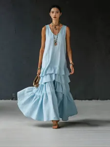 Einfarbiges lockeres ärmelloses Maxikleid mit großem Saum für Damen Frühlingsstil.