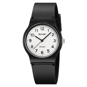 Minimalist quartz watch for men and women with black silicone strap and clear dial digits.