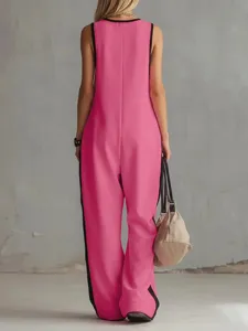 Tuta rosa senza maniche con eleganti bande laterali nere, vista dettagliata del retro.