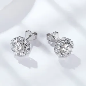 Lab-grown diamond snowflake stud earrings for women, sparkling silver jewelry fashion accessory.