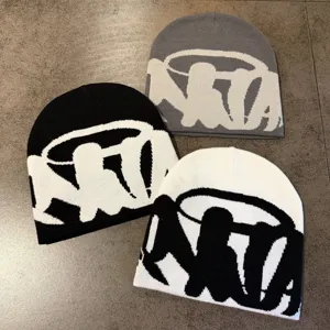 Casual street style knit beanie hat with bold letter jacquard design, soft warm winter hat