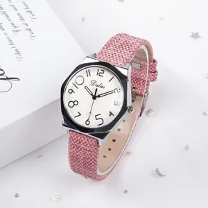 Pink canvas strap women quartz watch with white dial and clear numbers for daily wear.