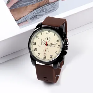 Orologio al quarzo elegante con cinturino in silicone marrone e quadrante beige dettagliato.
