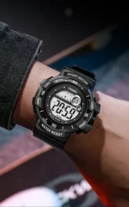 Detailed view of the black digital sport watch featuring a durable resin strap and digital display.