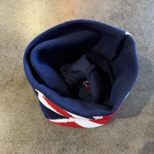 Winter gebreide muts beanie met klassiek vlag jacquard patroon, warm en stijlvol.