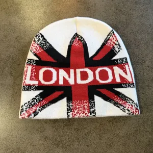 Gebreide muts met Britse vlag en London tekst, warme winter outdoor sport casual mode muts.
