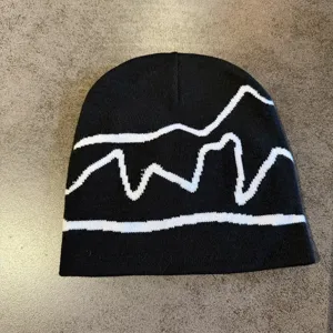 Berretto in maglia a righe ondulate retro americano per uomo e donna cappello lana invernale.