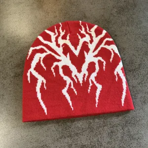Bonnet en tricot rouge avec motif toile d'araignée blanche bonnet chaud d'hiver style streetwear
