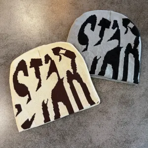 Close up of winter knit beanie with stylish letter graphics, streetwear hip-hop style headwear.