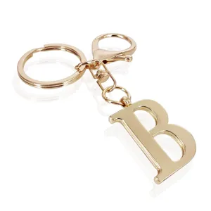 Gold letter B metal keychain with clasp, stylish bag pendant accessory for everyday keys.