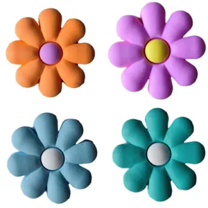 Colorful daisy shoe charms for clogs, cute 8-petal PVC floral jibbitz accessories.
