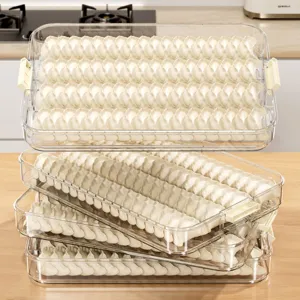 Clear plastic multi-layer dumpling storage box for kitchen refrigerator freezer organization.