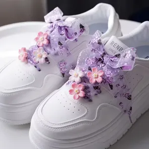 White platform sneakers with purple organza sheer bow and pink cherry blossom floral decors.