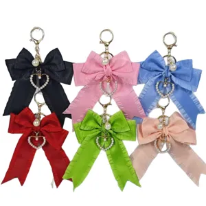 Pleated ribbon bow keychain with pearl heart pendant, stylish women bag car key ring.