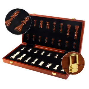 Wooden folding magnetic chess set with recessed storage slots and secure metal buckle.