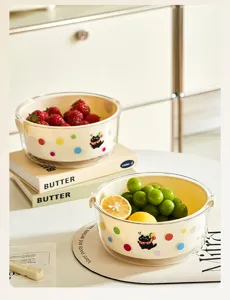 Double layer draining fruit basket detail shot, cute cat sticker and colorful polka dots design.