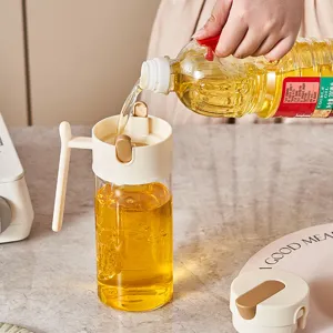 Bouteille à huile en verre borosilicaté pour cuisine, couvercle à ouverture automatique.