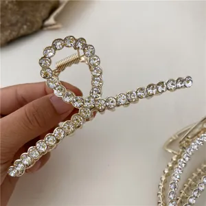 Elegante goldene Strass Haarklammer für Damen glänzende Kristall Haarspange Haarschmuck