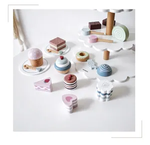 Wooden afternoon tea dessert toy set detail, multi-layer cake stand with wooden sweets.