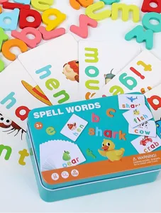 Close-up detail of children's english spelling game set with colorful wooden letters and cards.