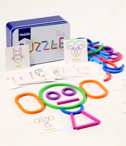 Kids English learning puzzle set with colorful geometric shapes and cards for fun desktop game.