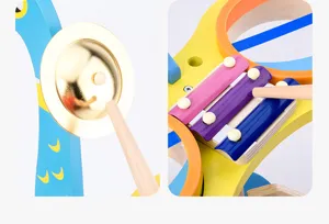 Wooden musical toy detail shot showcasing vibrant xylophone keys and golden cymbal craftsmanship.