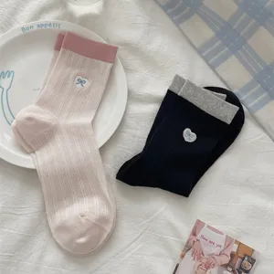 Women thin cotton mesh mid-calf socks with cute heart bow embroidery and color block design.