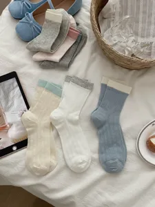 Women's mid-tube cotton socks spring summer breathable casual solid color socks flat lay