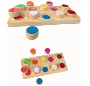 Holz-taktiles Gedächtnis Zuordnungsspielzeug Detail mit bunten Zylinderblöcken.