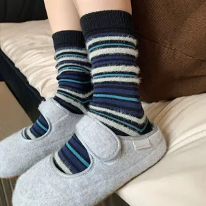 Retro colorblock striped fuzzy socks for women, cozy winter warm mid-calf casual hosiery.