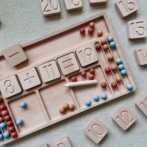 Wooden math toy detail showing carved numbers blocks and counting beads for early education.