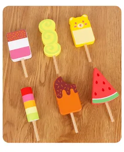 Wooden ice cream toy set detail showing colorful assorted popsicle designs on wooden table.