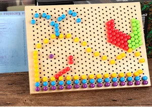 Wooden pegboard toy with colorful mushroom nails for kids creative mosaic puzzle early learning.