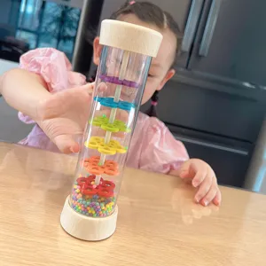 Children wooden rainmaker toy with colorful beads and flower discs for sensory development.