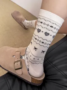 Vintage Fair Isle heart bow cotton mid-tube socks for women cute korean style daily wear.