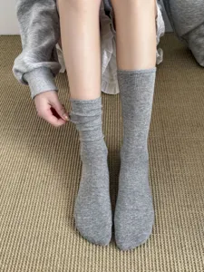 Classic grey slouch socks for women, versatile ribbed knit long socks for daily wear casual style.