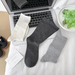Women solid color long stack socks basic cotton calf hosiery casual daily wear item.